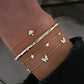 14kt gold and diamond butterfly row bracelet