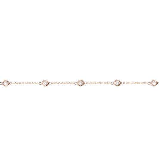 14kt gold seven diamond bezel bracelet