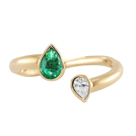 14kt gold pear diamond and emerald open ring